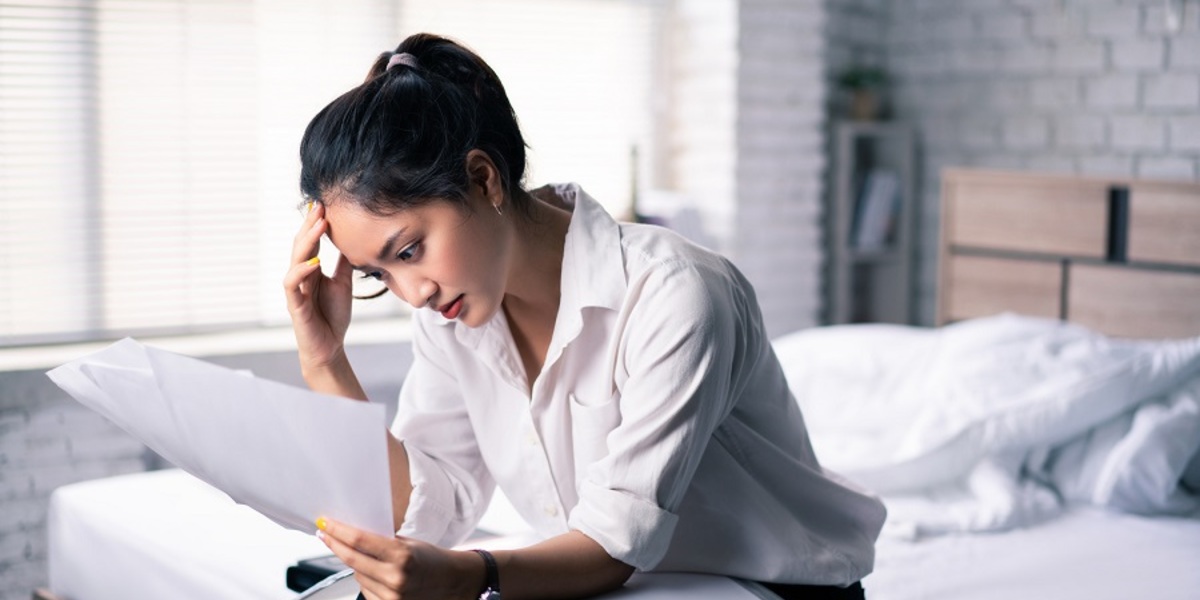 Woman reading serious on the paper